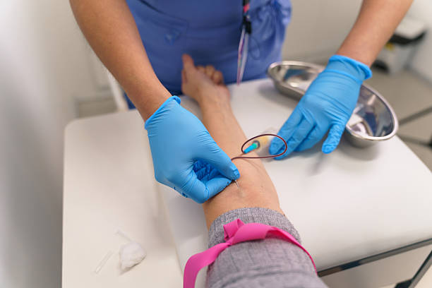 Nurse taking a blood sample