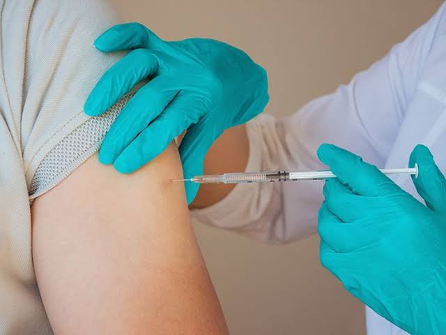 Nurse administering an injection